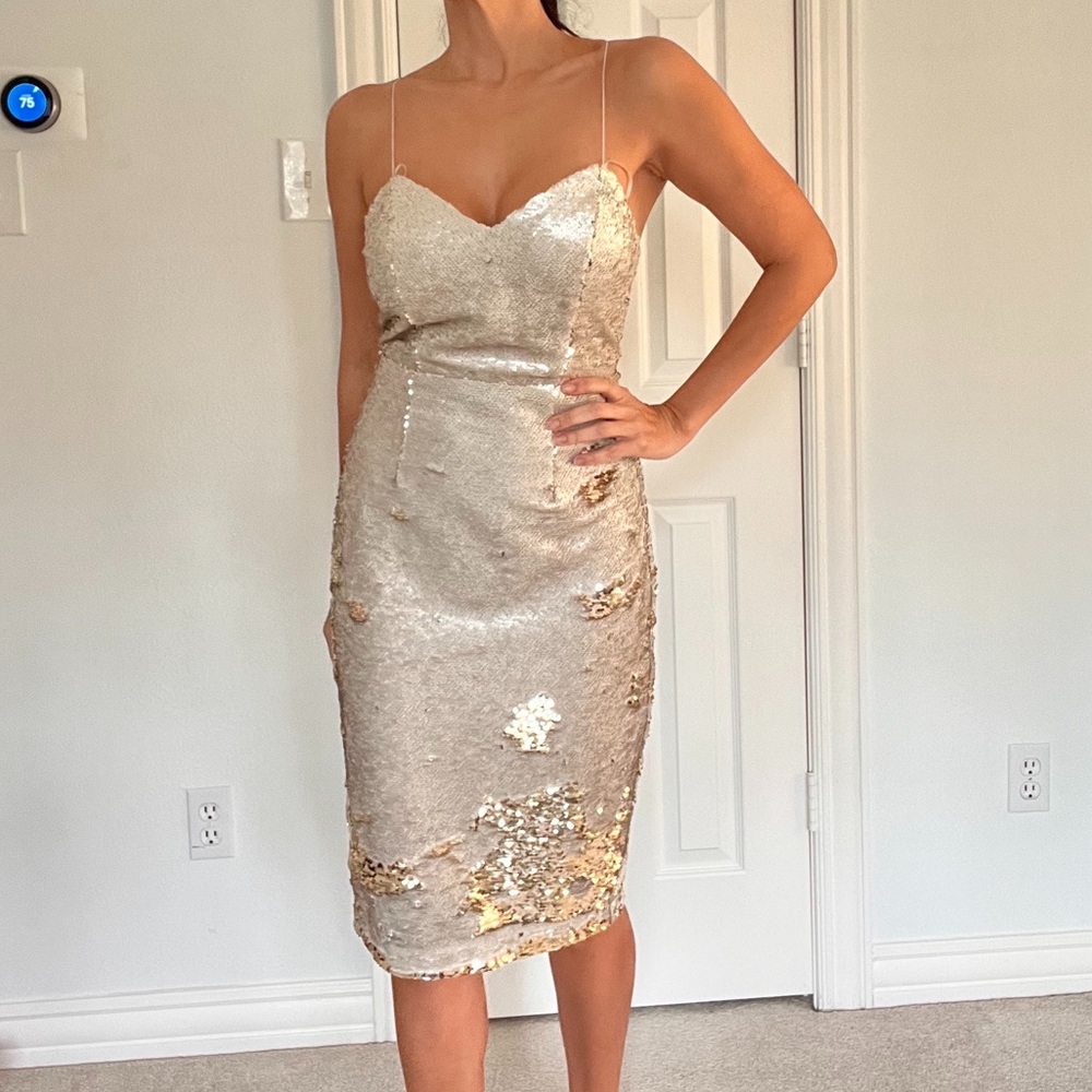 ASTR The Label Sexy back sequin dress. Cross stretch straps on the back.